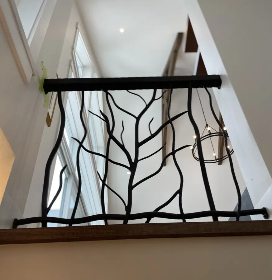 Branch guard at a stair landing