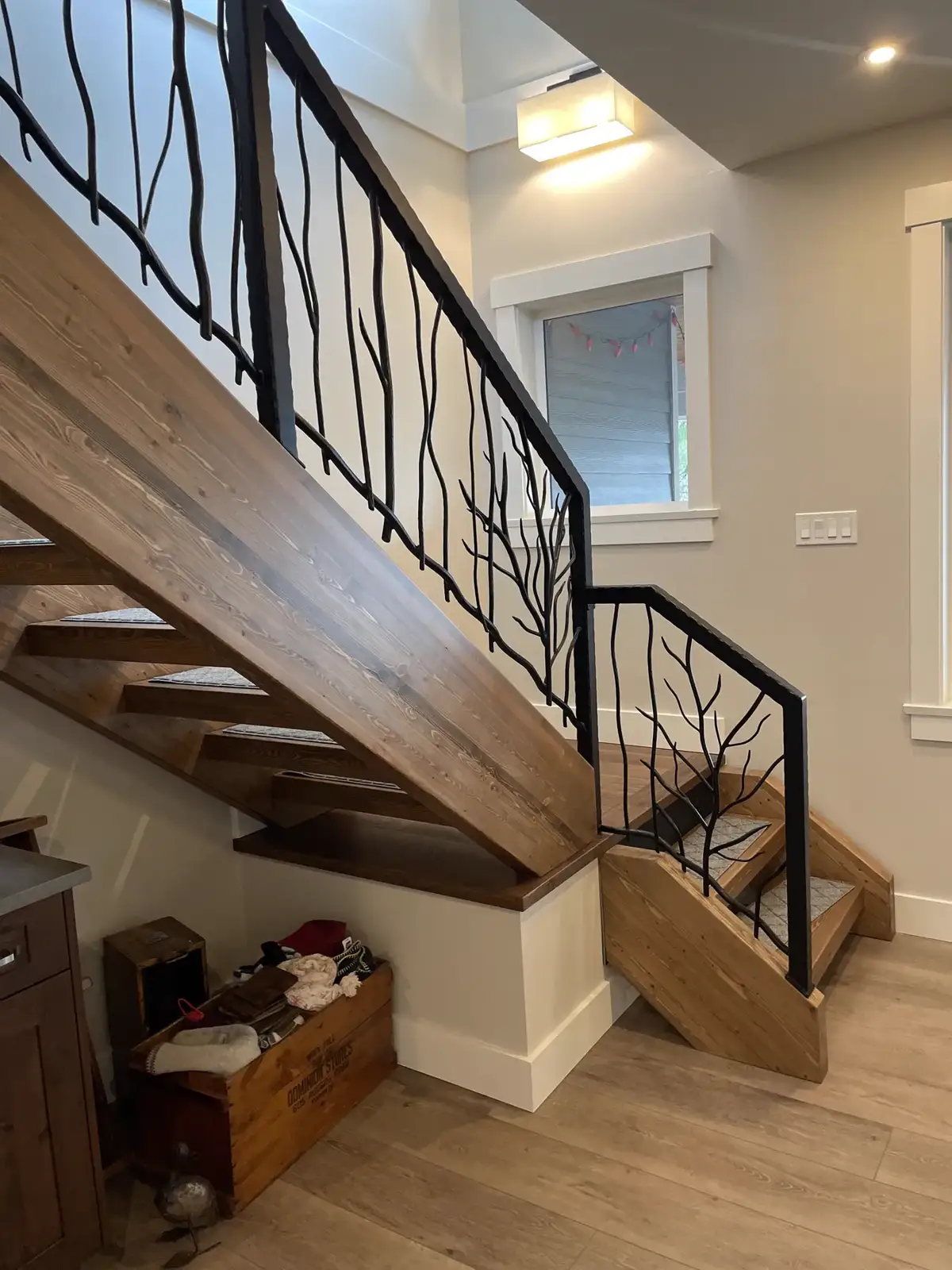 Branch railing on a wood stair