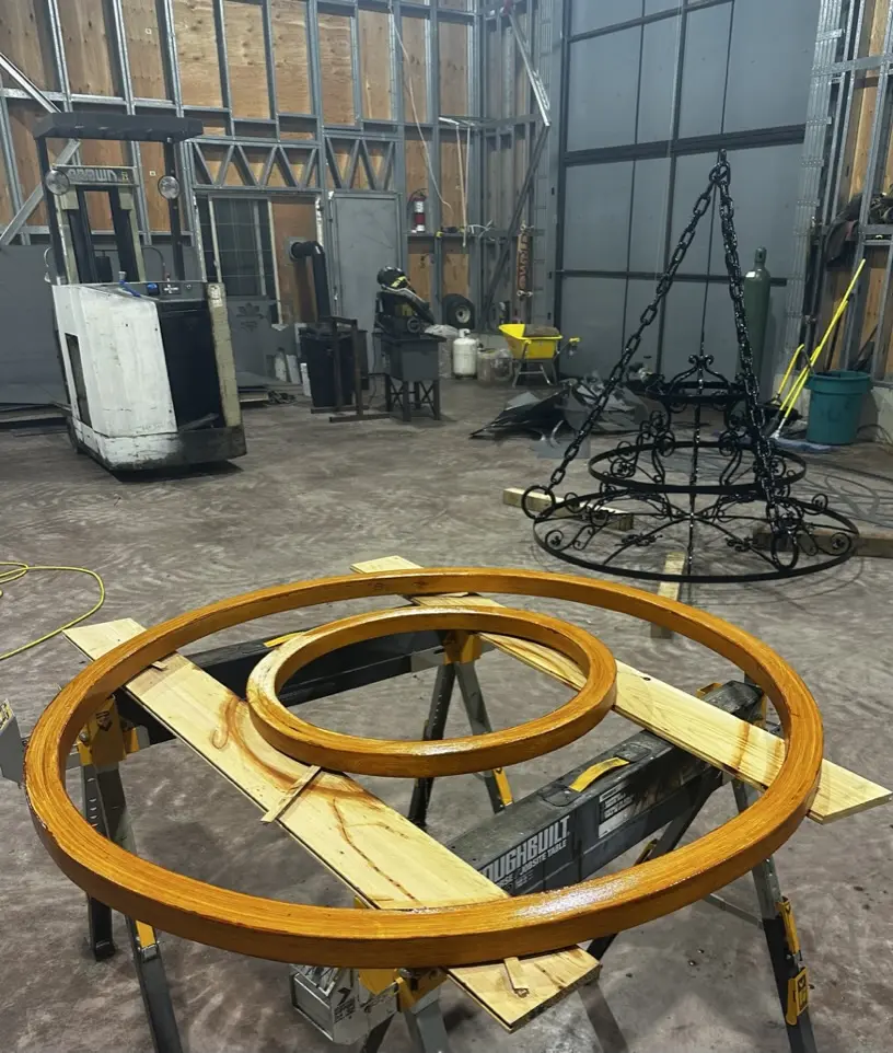 The chandelier rings being assembled in the shop