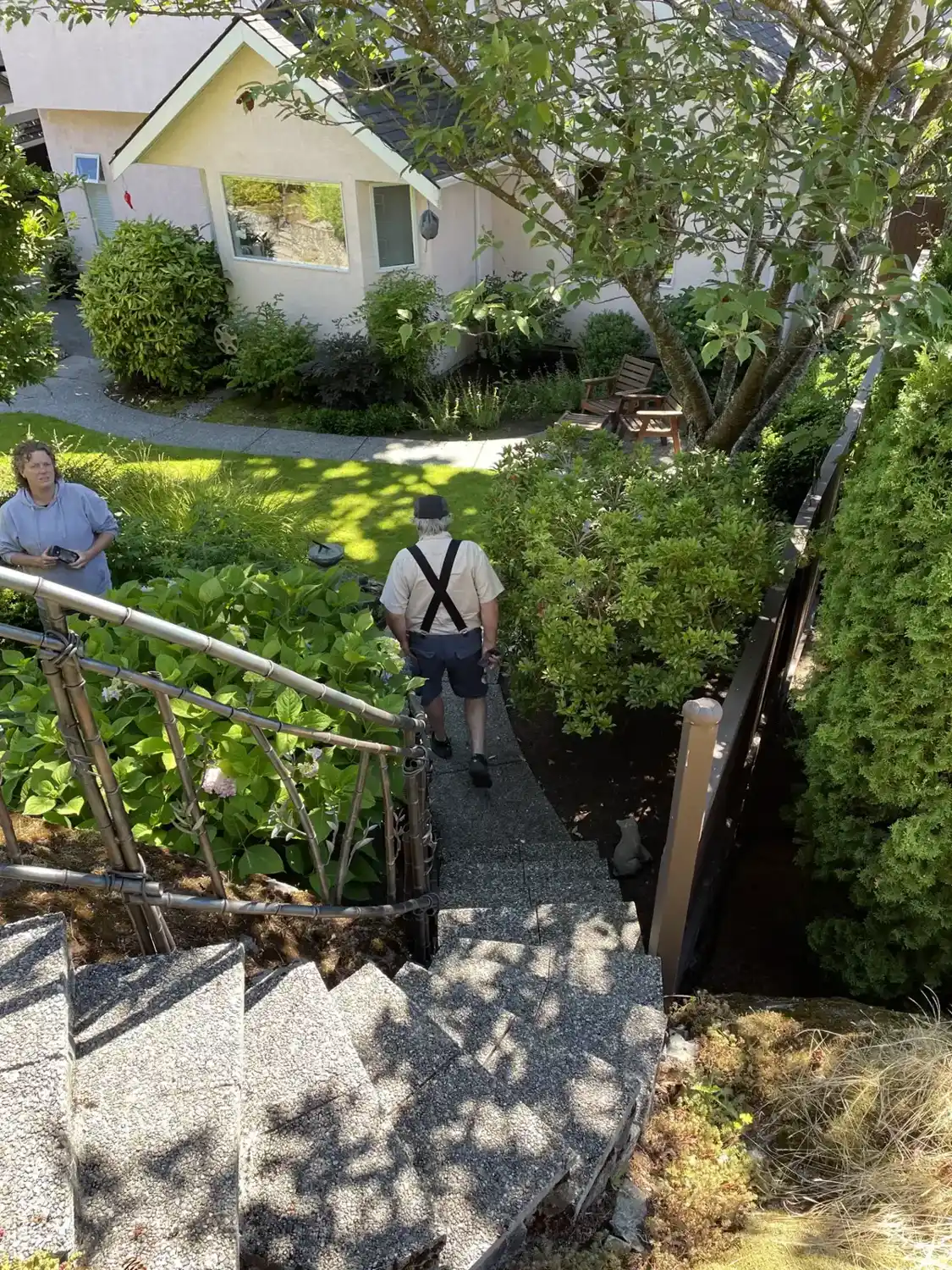 The handrail winding through the garden
