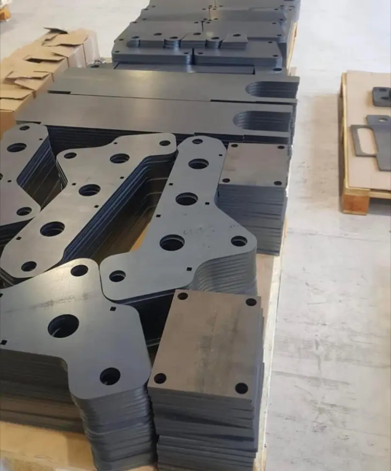 Stack of laser-cut steel parts